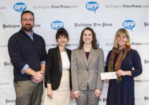 The Burlington Free Press and Hannaford Supermarkets present the Vermont Foodbank with a $3200 donation. Pictured from left to right: from Burlington Free Press: Pat McDonough, Distribution Manager, Kasia Abrams, Customer Sales and Marketing Manager, from Hannaford: Samara Bushey, Director of Operations in Vermont, From VT Foodbank, Cassie Lindsay, Donor & Corporate Relations Manager