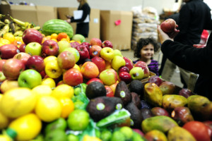 Photo of child near a produce display