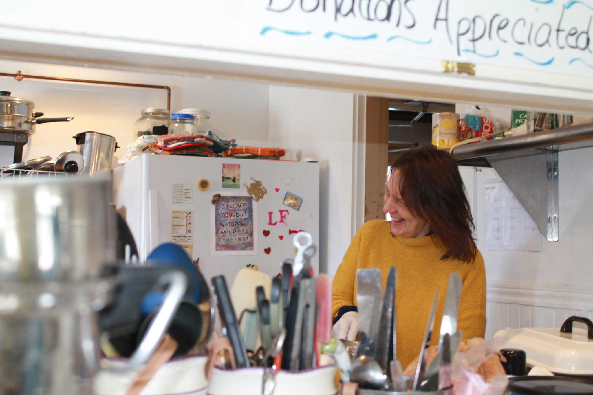 Photo of Karen in kitchen.