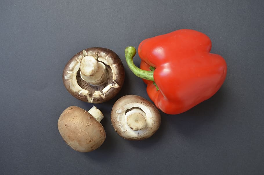 Photo of mushrooms and a red bell pepper