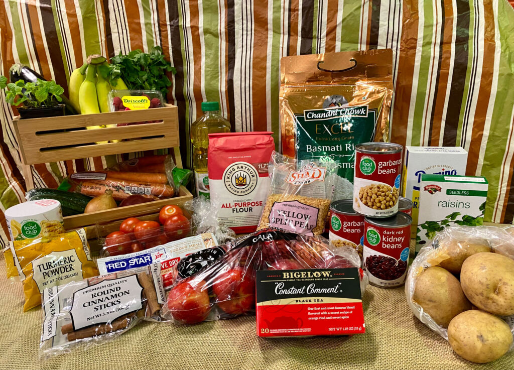 Foods included in the Afghan Welcome Box include flour, rice, chickpeas, spices and fresh produce.