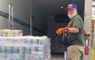 Photo of Dan, a Vermont Foodbank driver, who's on the road each work day delivering food and produce for people facing hunger around the state.