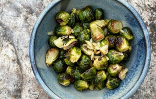 Photo of a bowl of Roasted Brussels Sprouts & Garlic