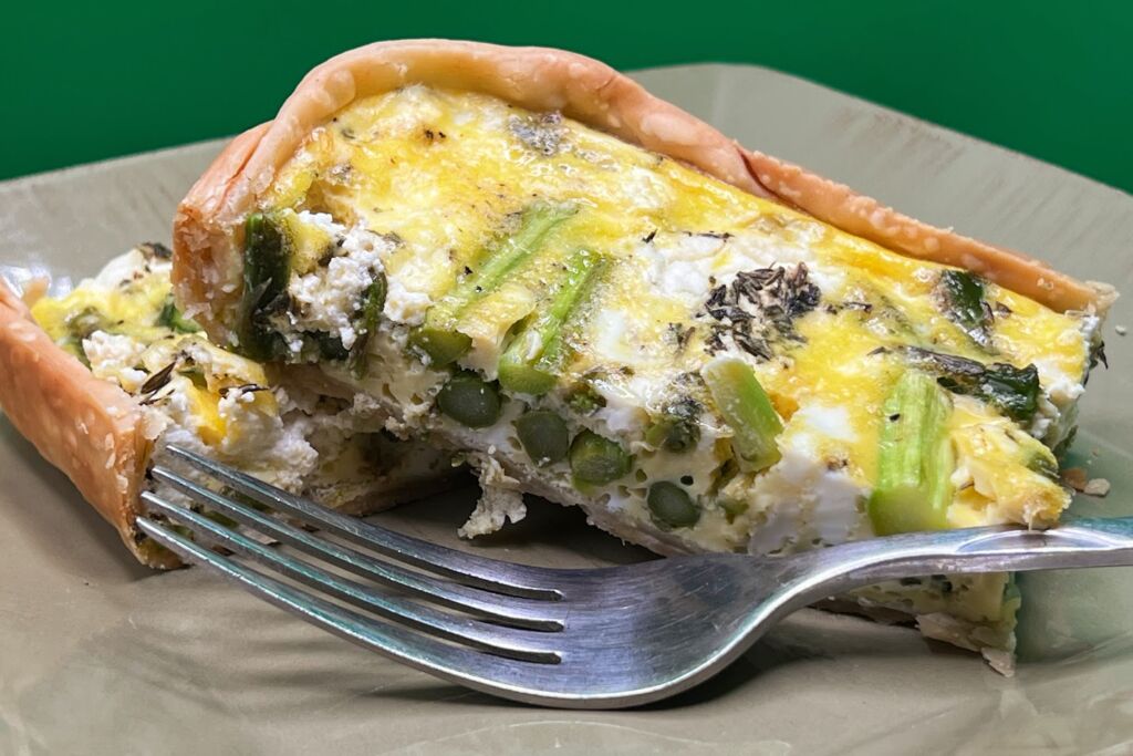 Photo of Asparagus, Egg & Cheese plated 2 pieces close up on sage colored plate
