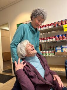 Diana helped start the Onion River Food Shelf in the 1980s and continues to run the organization with help from volunteers like Kim.